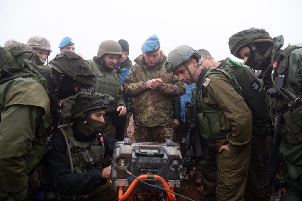 Israeli soldiers show UNIFIL commander Maj. Gen. Stefano Del Col (centre) a Hezbollah tunnel that penetrated Israeli territory from southern Lebanon on December 6, 2018.