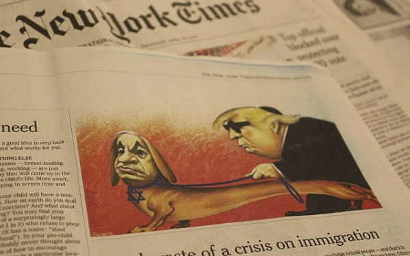 The antisemitic political cartoon printed in the international edition of the New York Times, April 25, 2019 (Photo by Raoul Wootliff/Times of Israel).