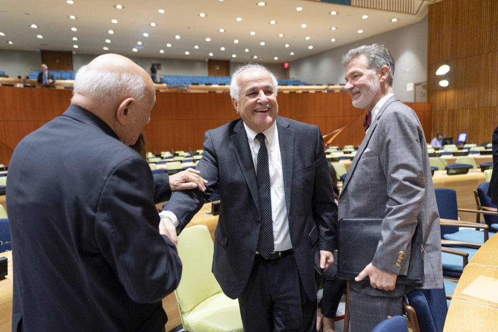 Riyad Mansour (centre), Permanent Observer of the State of Palestine to the United Nations, meeting with Peter Mulrean (right), UNRWA director at the recent UN General Assembly meeting.