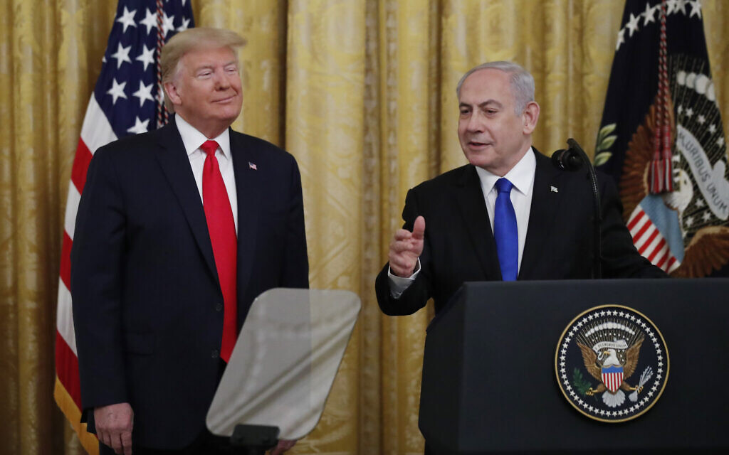 Israeli Prime Minister Benjamin Netanyahu speaks during an event with President Donald Trump in the East Room of the White House in Washington, Tuesday, Jan. 28, 2020, to announce the Trump administration's much-anticipated plan to resolve the Israeli-Palestinian conflict. (AP Photo/Alex Brandon)