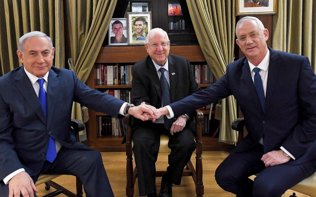 Gantz (right) and Netanyahu (left) have been discussing a unity government at the request of President Rivlin (centre) over the past three inconclusive elections in Israel - but have not succeeded in reaching a deal until now.