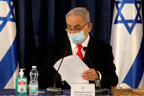 Prime Minister Benjamin Netanyahu chairs the weekly cabinet meeting in Jerusalem, June 7, 2020. (Credit: Menahem Kahana / AP)