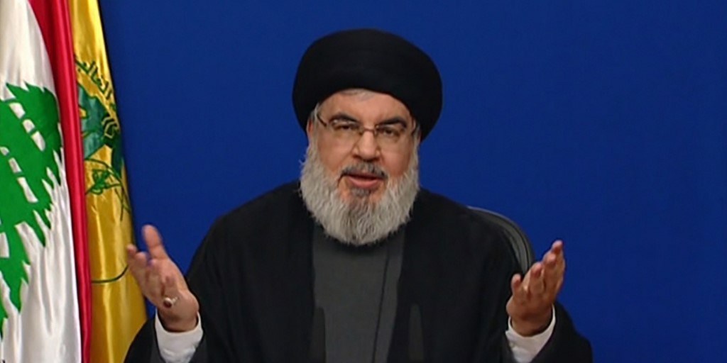 Hezbollah Secretary-General Hassan Nasrallah: Now happy to accept funding from the “Great Satan” (Credit: AL-MANAR TV / AFP)