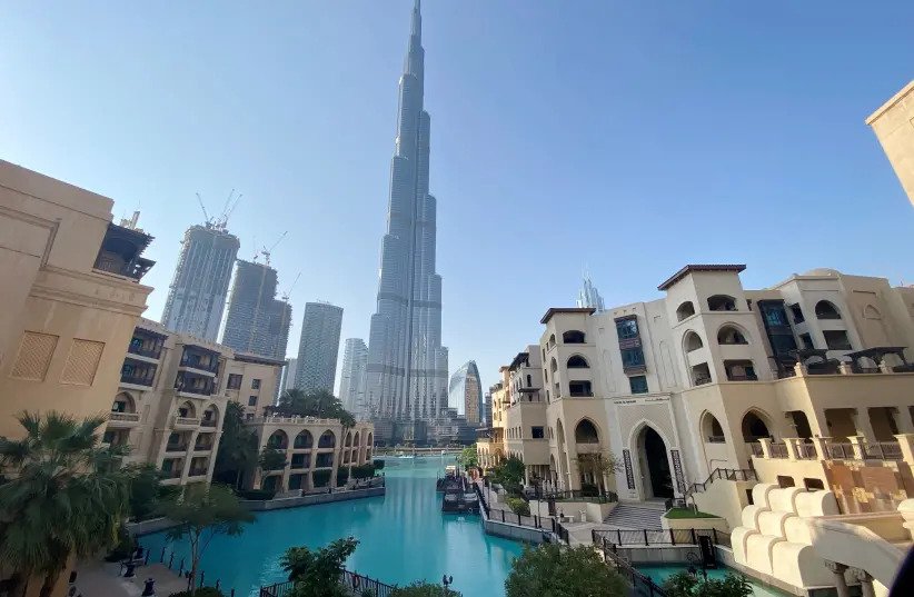 A general view shows the area outside the Burj Khalifa, the world's tallest building, mostly deserted, after a curfew was imposed to prevent the spread of the coronavirus disease (COVID-19), in Dubai.  Picture taken March 25, 2020 (photo credit: REUTERS/TAREK FAHMY)