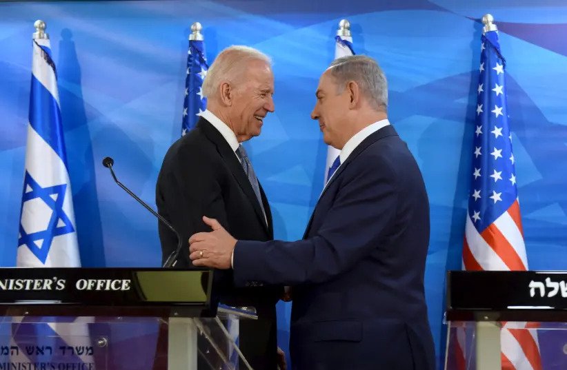 Then US Vice President Joe Biden (L) shakes hands with Israeli Prime Minister Benjamin Netanyahu as they deliver joint statements during their meeting in Jerusalem March 9, 2016 (photo credit: REUTERS/DEBBIE HILL)