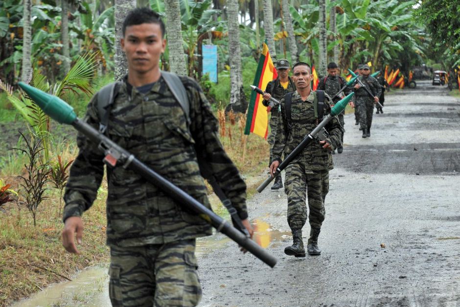 Former Moro Islamic Liberation Front rebels out on patrol