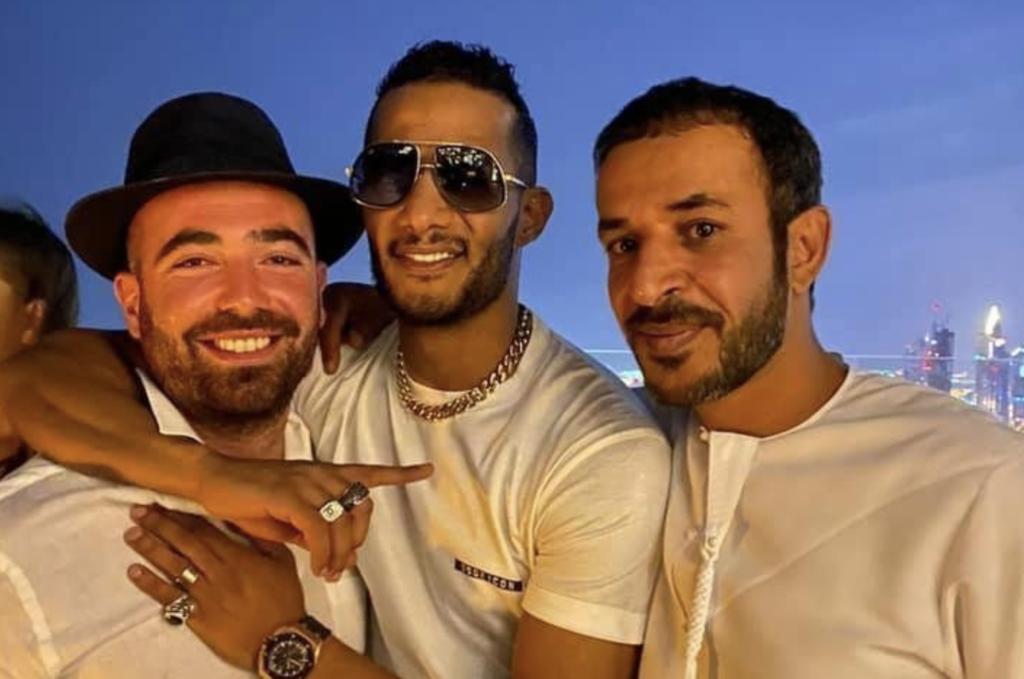 L-R: Israeli singer Omer Adam, Egyptian actor Mohamed Ramadan and Israeli footballer Dia Saba on a Dubai rooftop