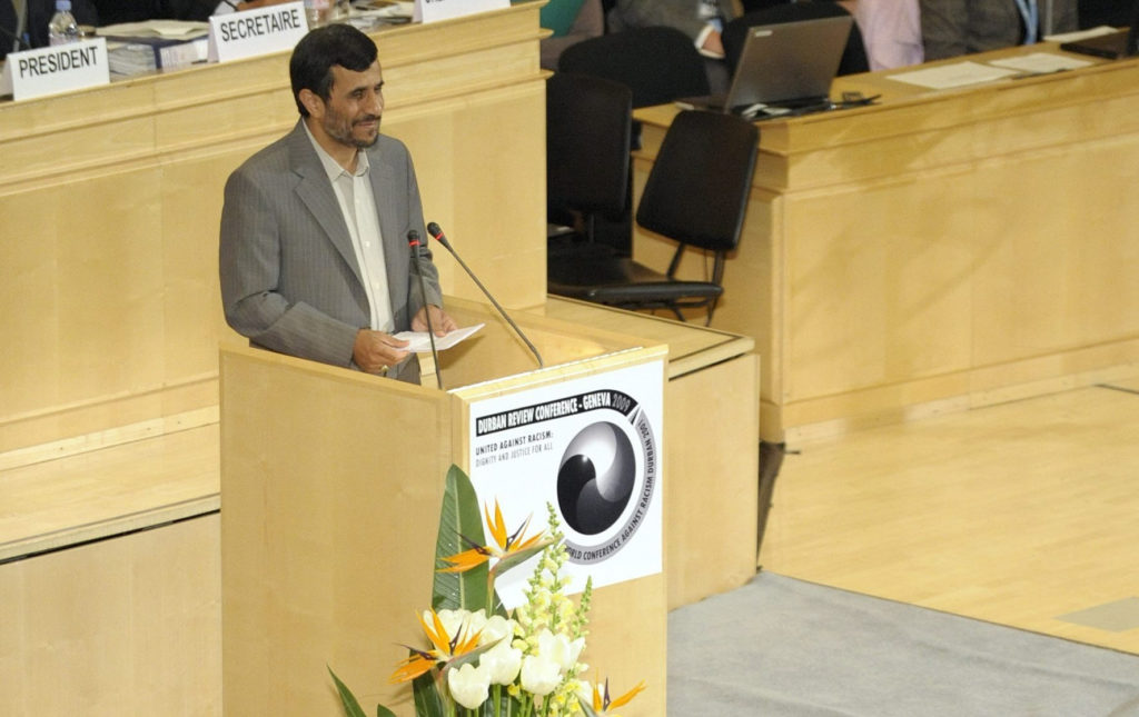 Then-Iranian President Mahmoud Ahmadinejad during the opening of the Durban Review Conference (UN's Conference against Racism) at the European headquarters of the United Nations in Geneva, 2009. (Credit: AP Photo/Laurent Gillieron)