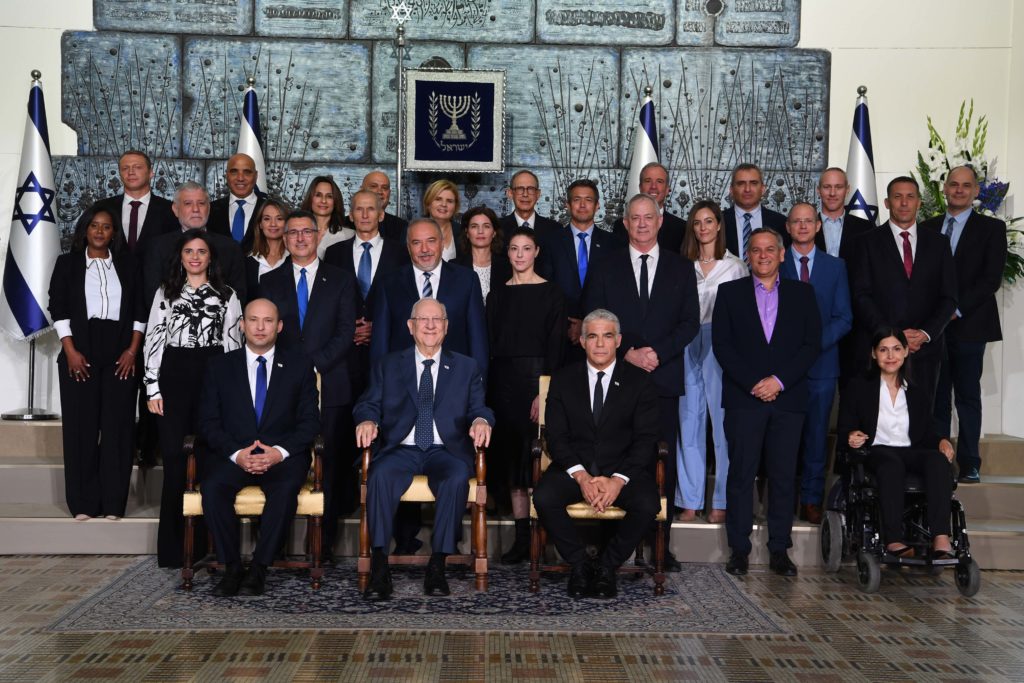 Members of Israel’s new ministry led by Prime Minister Naftali Bennett sit with President Reuven Rivlin in Jerusalem (Source: Israeli Government Press Office/ Flickr)