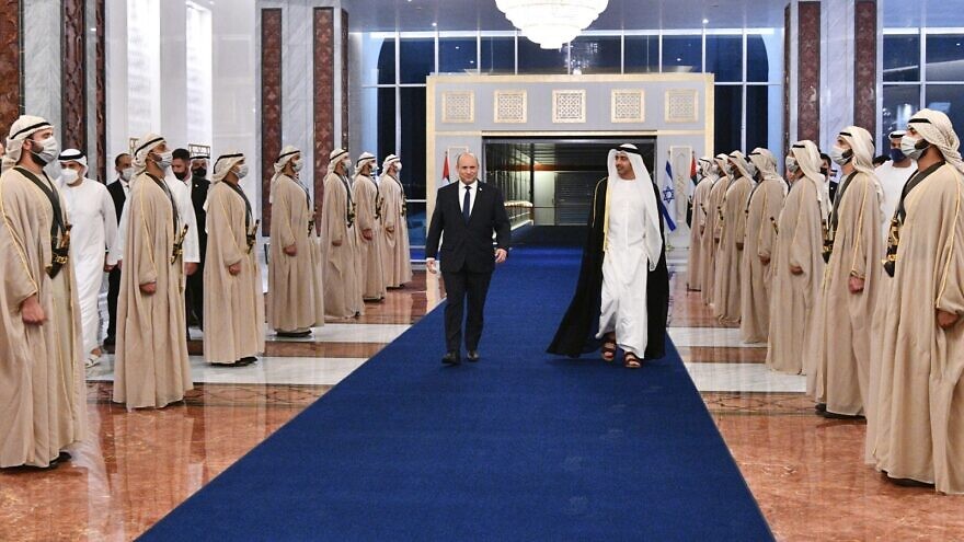 Israeli Prime Minister Naftali Bennett is greeted by Abu Dhabi Crown Prince Sheikh Mohammed bin Zayed at his private palace in Abu Dhabi, Dec. 13, 2021. (Credit: Haim Zach/ IGPO)