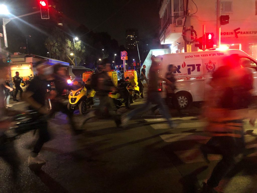Emergency services rush to the site of the Tel Aviv bar attack, which killed three civilians, on April 8 (Image: Matan Golan/Sipa USA/Alamy Live News)