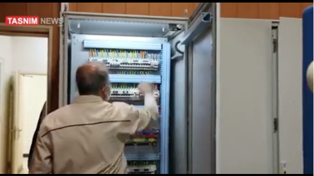 A screenshot from a video released to the Iranian media by the regime showing workers shutting off the power to IAEA cameras at Iranian nuclear facilities. (Source: Tasnim News)