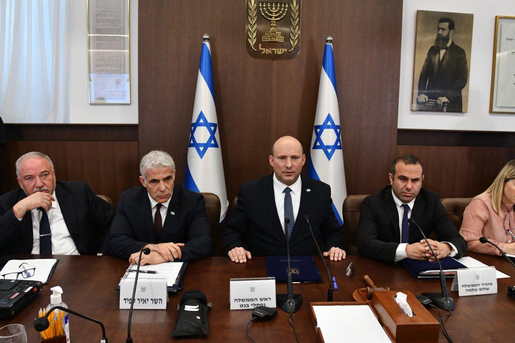 Outgoing PM Naftali Bennett with some of the key players in his politically diverse cabinet (Image: Flickr)