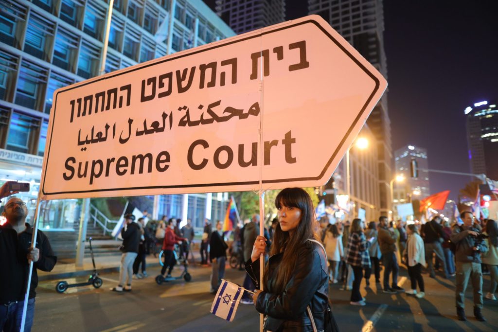 A statement made by Israel’s Justice Minister Yariv Levin declaring his intention to reform and limit the power of the Israeli Supreme Court led thousands of people to demonstrate against the new Netanyahu Government in Tel Aviv on January 21, 2023. (Image: AAP/ Abir Sultan)