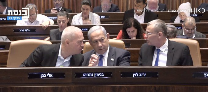 PM Netanyahu flanked by Justice Minister Yariv Levin (r), the main architect of the judicial reform package, and Defence Minister Yoav Gallant (l), known to favour compromise on the reforms, during the Knesset debate over passage of the "reasonableness" clause" on July 25 (Image: Screenshot, Kan TV). 