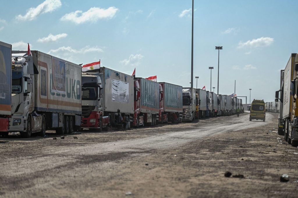 Aid convoy trucks in front of the Rafah border crossing between Egypt and the Gaza Strip (Image: Sayed Hassan/Alamy Live News)