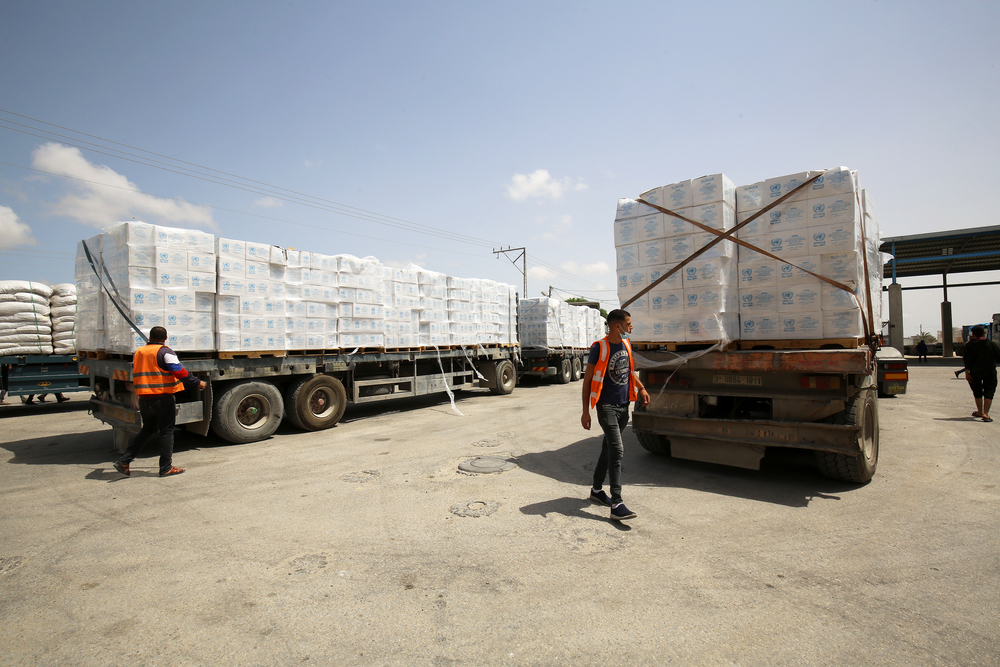 Aid trucks crossing into Gaza in May 2021 (image: Shutterstock/Anas-Mohammed)