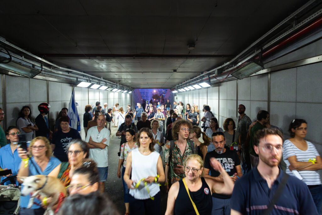 Israeli civilians rushing into public shelters as the sirens go off during the ongoing Hamas-Israel war (Image: Shutterstock)