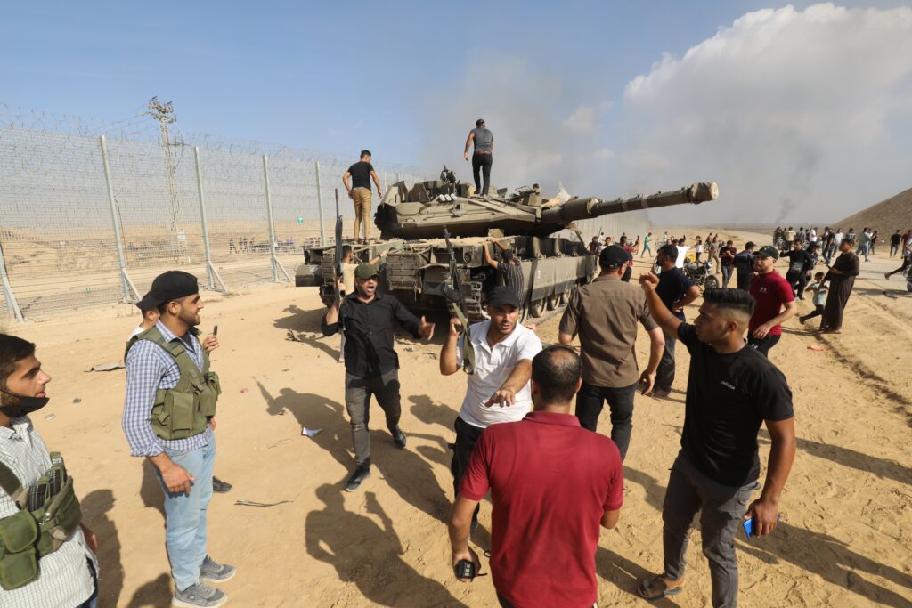 The Fiasco: Gazans capture an Israeli tank on October 7 (Image: Anas Mohammed/ Shutterstock