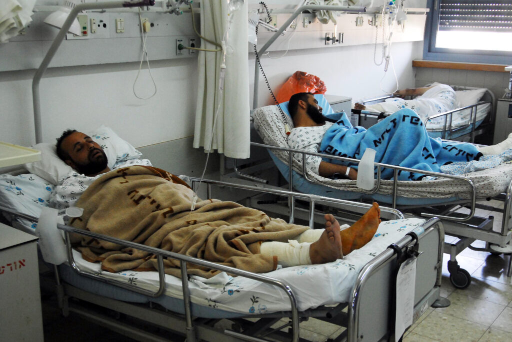 Palestinian men rest in Israel's Barzilai Hospital (Image: Shutterstock)