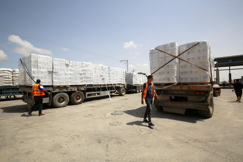 Aid trucks crossing into Gaza (Image: Shutterstock/ Anas Mohammed)
