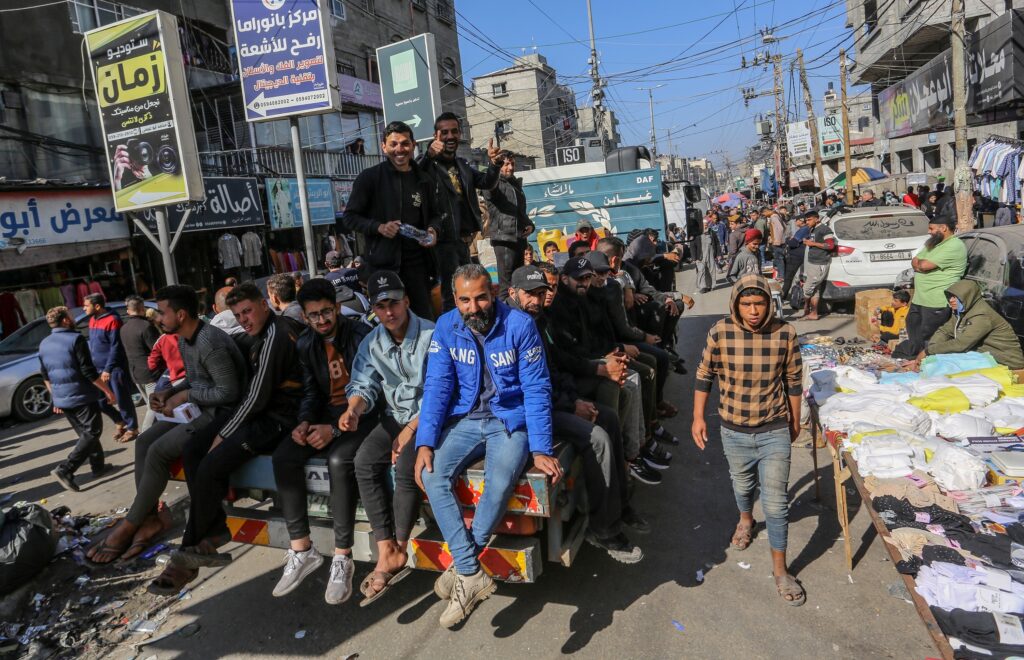 Palestinians,Crowd,At,A,Local,Street,Market,In,Rafah.,Unrwa Palestinians crowd at a local street market in Rafah (Image: Anas Mohammed/ Shutterstock)