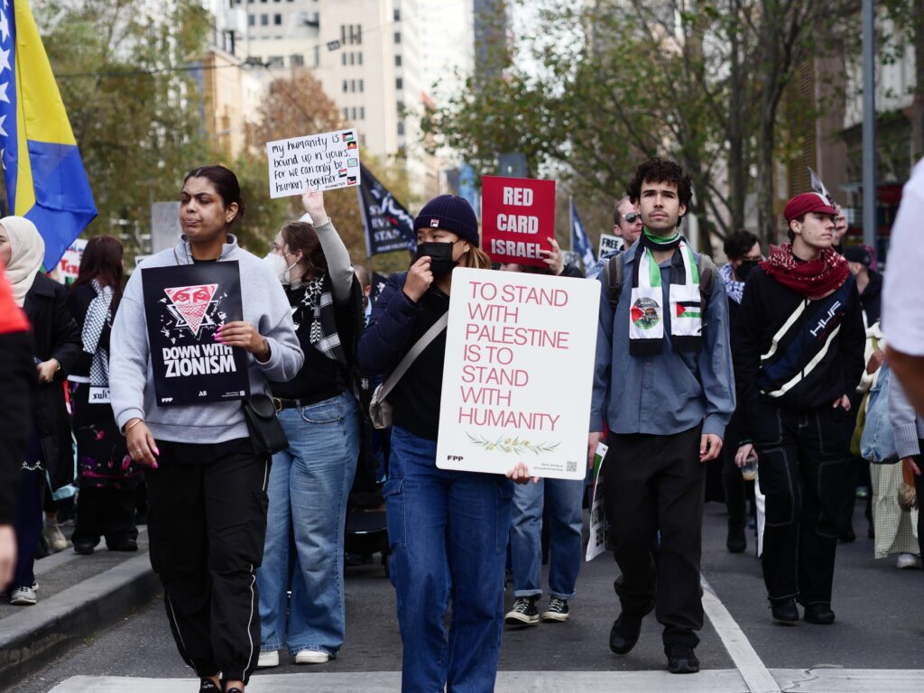 Protesters in Melbourne (Image: Marius Amerio-Cox/ Shutterstock)