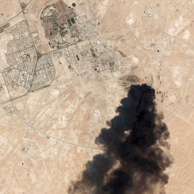 A satellite image shows black smoke rising from one of the attacked Saudi oil facilities. (Planet Labs Inc, AP)