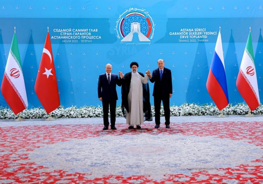 Iranian President Ebrahim Raisi and Russian President Vladimir Putin, Turkish President Recep Tayyip Erdogan during the 7th summit in Astana format for talks on the Syrian war at a three-way summit overshadowed by fallout from his country's war on Ukraine. Tehran, Iran, July 19, 2022. (Image: SalamPix/ABACAPRESS.COM/AAP)