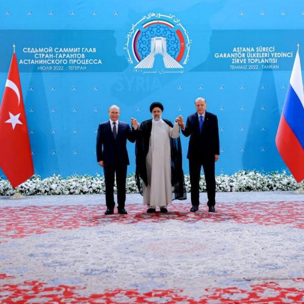 Iranian President Ebrahim Raisi and Russian President Vladimir Putin, Turkish President Recep Tayyip Erdogan during the 7th summit in Astana format for talks on the Syrian war at a three-way summit overshadowed by fallout from his country's war on Ukraine. Tehran, Iran, July 19, 2022. (Image: SalamPix/ABACAPRESS.COM/AAP)