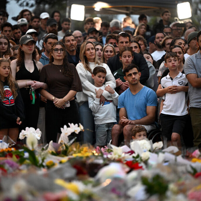 Mourners attend a vigil at a memorial in Bondi Beach in Sydney, December 15, 2025, after gunmen opened fire on Bondi Beach, killing 15 people in an attack targeting the Jewish community (Image: AAP Image/ Bianca De Marchi) 