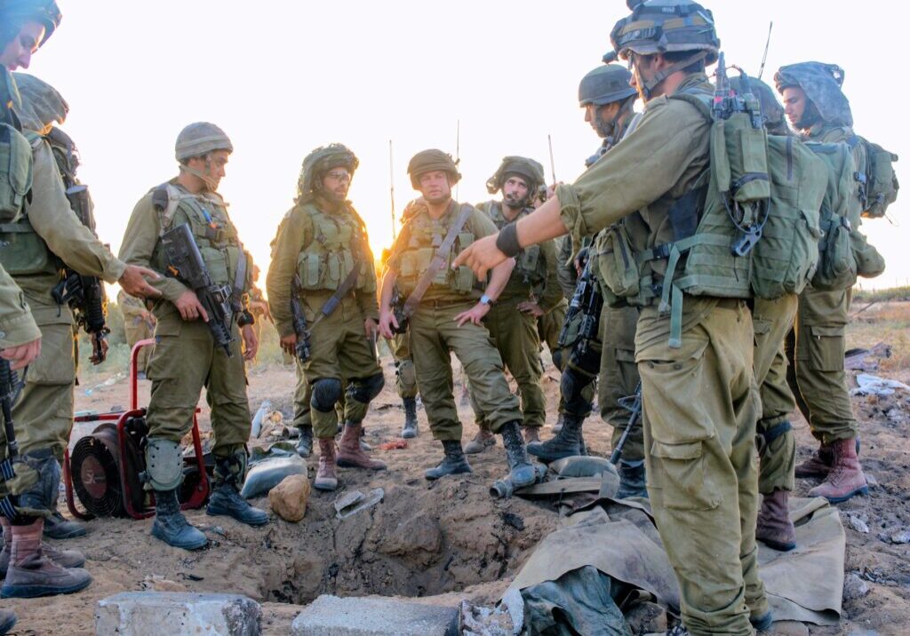 IDF soldiers surround a Gaza tunnel during Operation Protective Edge, 2014 (Image: Isranet)