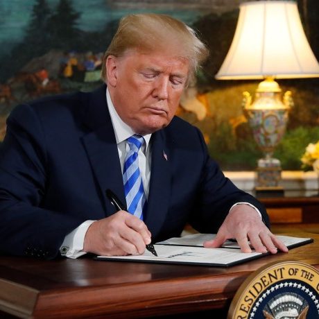 U.S. President Donald Trump signs a proclamation declaring his intention to withdraw from the JCPOA Iran nuclear agreement in the Diplomatic Room at the White House in Washington, U.S., May 8, 2018. REUTERS/Jonathan Ernst