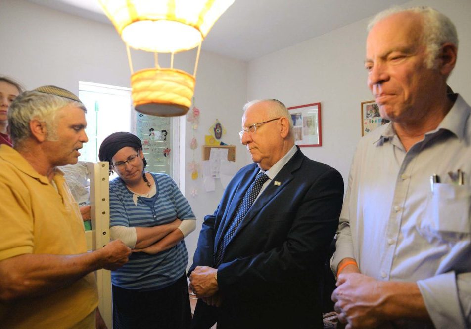 Known for being sympathetic and affable, Rivlin visited more than 250 bereaved families (Credit: Ashernet/Haim Zach/GPO)