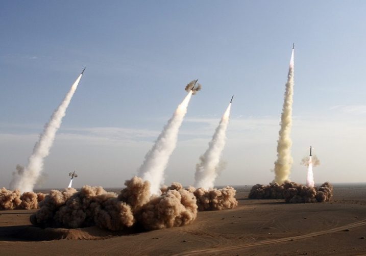 Iran's Islamic Revolutionary Guards Corps test-fires missiles during military maneuvers in the central desert outside the holy city of Qom (Archives: AFP/Fars News)
