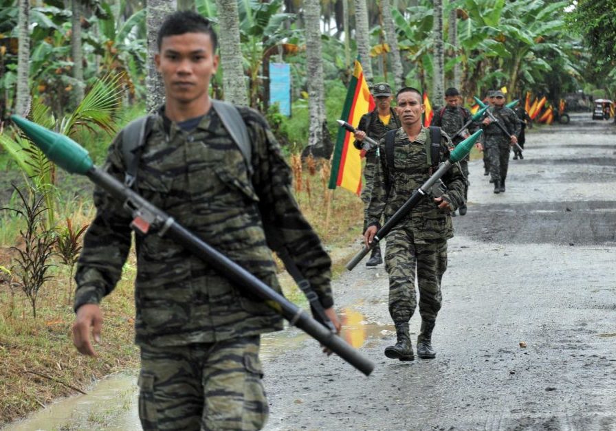 Former Moro Islamic Liberation Front rebels out on patrol