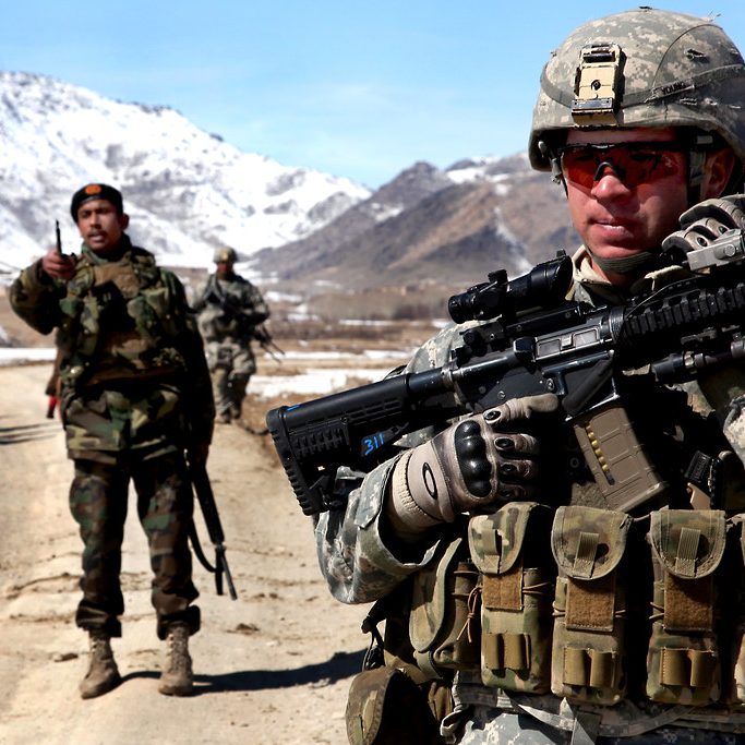 A US soldier patrols with Afghan soldiers in the village of Yawez in Wardak province, Afghanistan, 17 February 2010 (credit: U.S. Army, Flickr). 