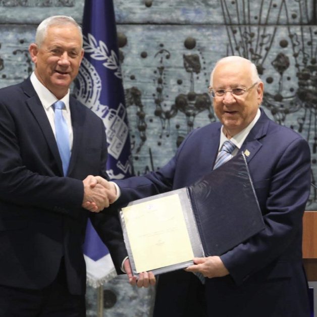 Over to you: Israeli President Reuven Rivlin (right) gives Benny Gantz a mandate to form a government