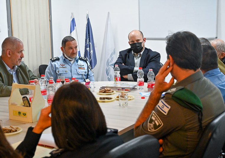 Israeli Prime Minister Naftali Bennett receives a briefing from police in Hadera on March 27. Credit: Kobi Gideon, GPO