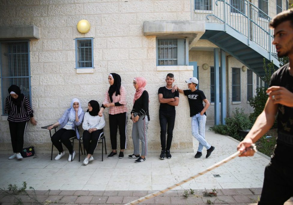 Young Palestinians at the community center in Sur Baher