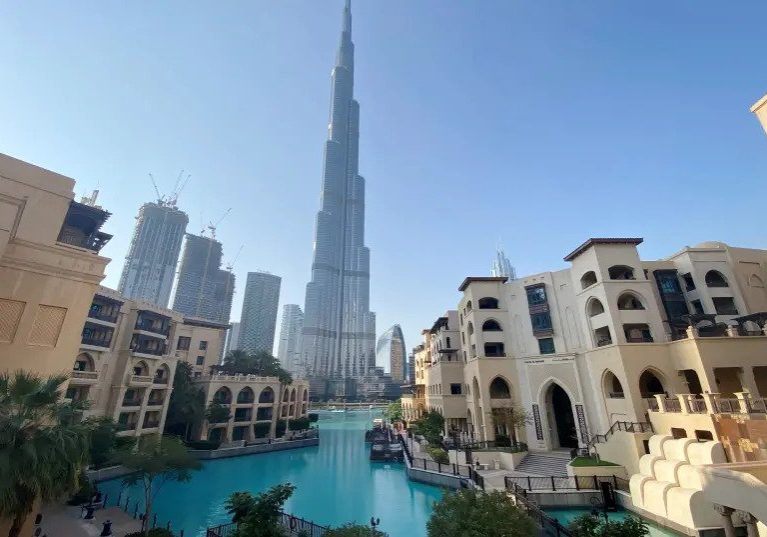A general view shows the area outside the Burj Khalifa, the world's tallest building, mostly deserted, after a curfew was imposed to prevent the spread of the coronavirus disease (COVID-19), in Dubai.  Picture taken March 25, 2020 (photo credit: REUTERS/TAREK FAHMY)
