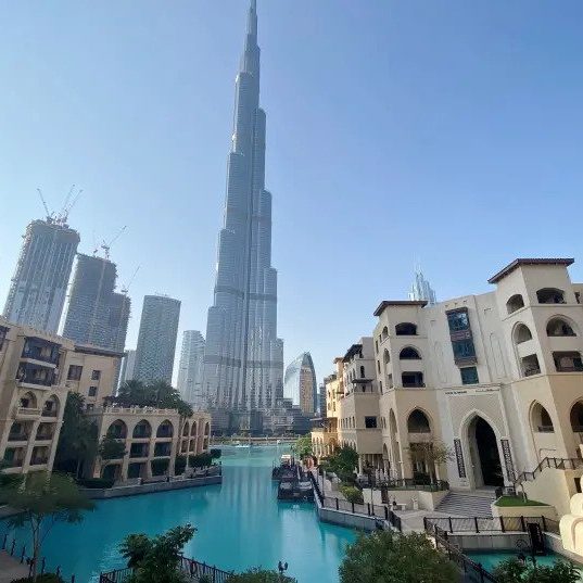 A general view shows the area outside the Burj Khalifa, the world's tallest building, mostly deserted, after a curfew was imposed to prevent the spread of the coronavirus disease (COVID-19), in Dubai.  Picture taken March 25, 2020 (photo credit: REUTERS/TAREK FAHMY)