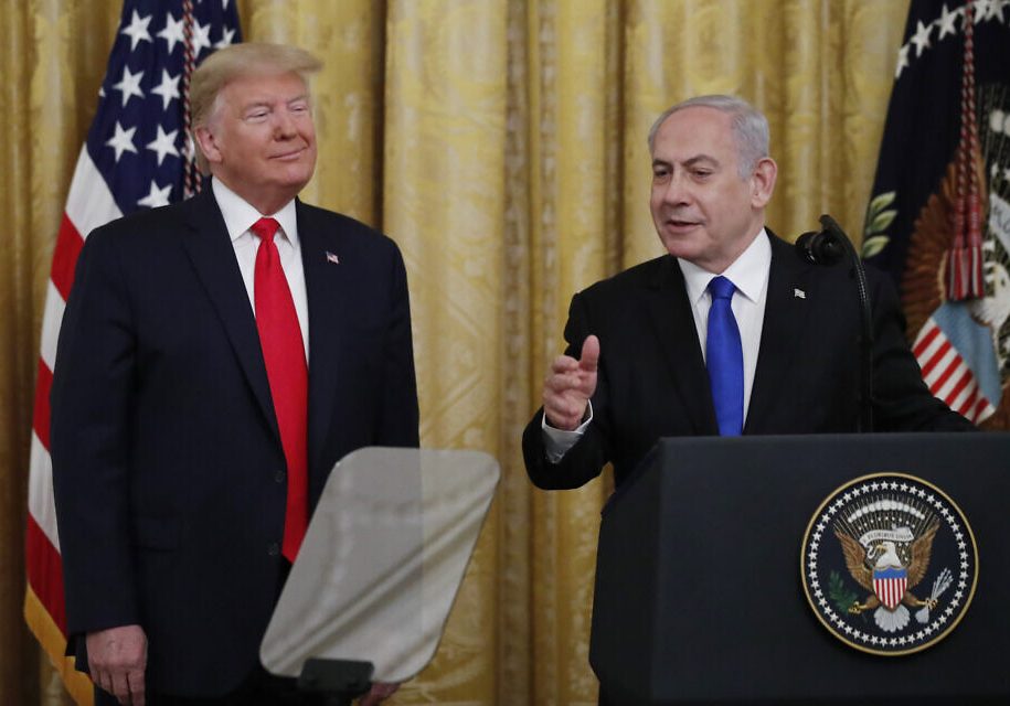 Israeli Prime Minister Benjamin Netanyahu speaks during an event with President Donald Trump in the East Room of the White House in Washington, Tuesday, Jan. 28, 2020, to announce the Trump administration's much-anticipated plan to resolve the Israeli-Palestinian conflict. (AP Photo/Alex Brandon)