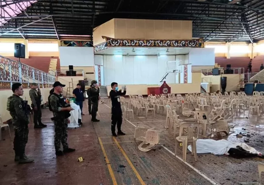 Authorities at the site of a Catholic Mass that a powerful explosion disrupted in Marawi City (Image: Rappler)