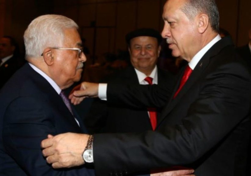 A worrying embrace: PA President Mahmoud Abbas with Turkish President Recep Tayyip Erdogan