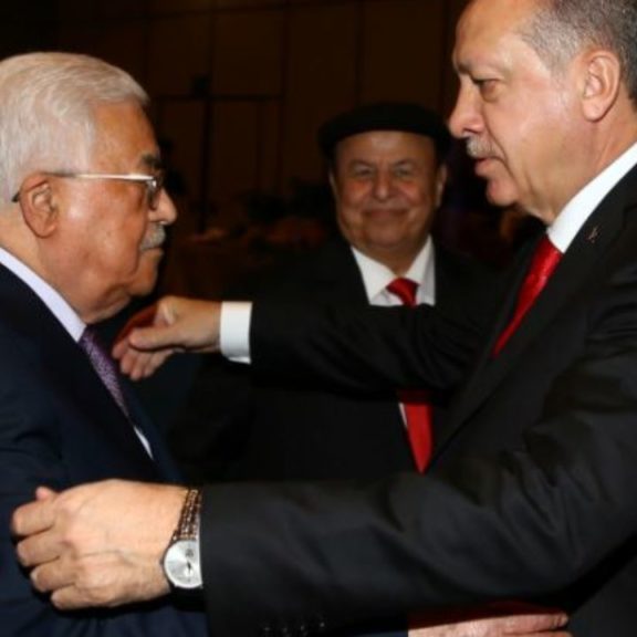 A worrying embrace: PA President Mahmoud Abbas with Turkish President Recep Tayyip Erdogan