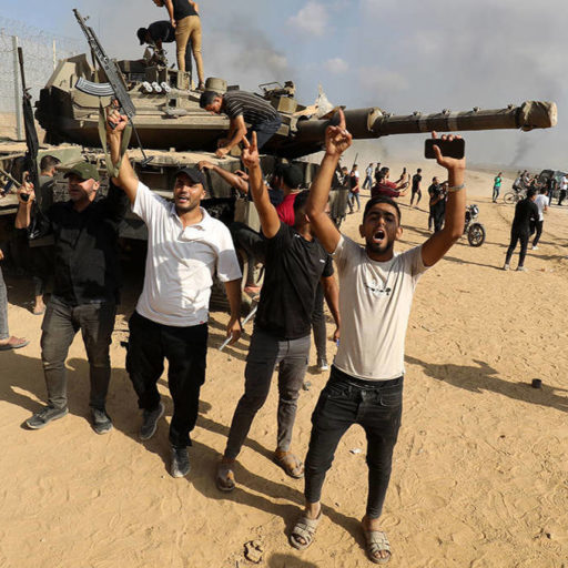 Palestinians celebrating the capture of an Israeli tank on October 7 – a symbol of Israel’s shattered security doctrine for Gaza (Image: X/ Twitter)