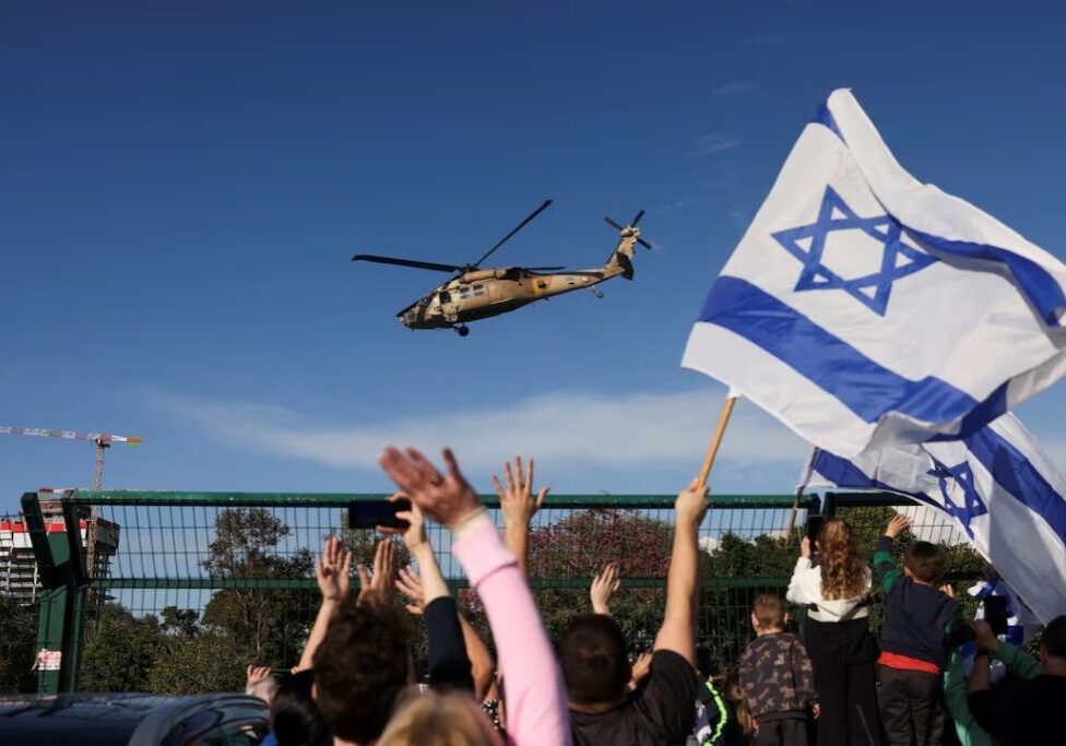 An Israeli helicopter bearing released hostages prepares to land (Image: X)