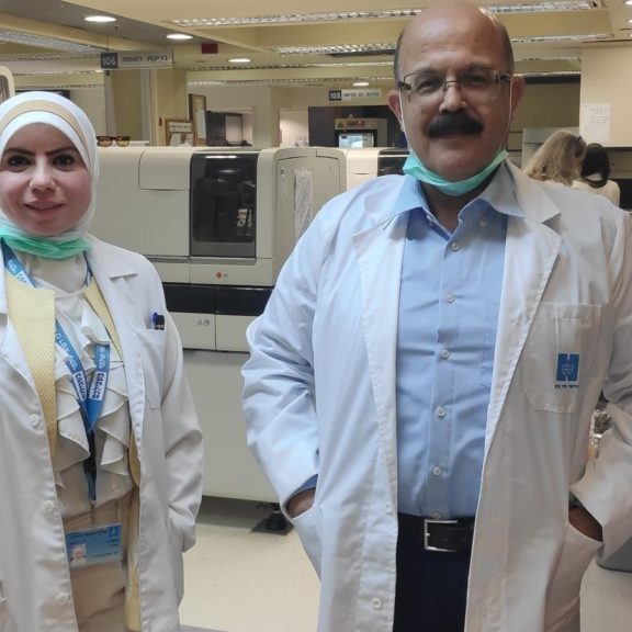 Dr. Abd Al-Roof Higazi and Lab Manager Suhair Abdeen at Hadassah University Medical Center have made important discoveries that may improve coronavirus treatment (Credit: Israel21c).