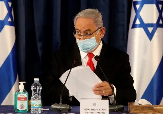 Prime Minister Benjamin Netanyahu chairs the weekly cabinet meeting in Jerusalem, June 7, 2020. (Credit: Menahem Kahana / AP)